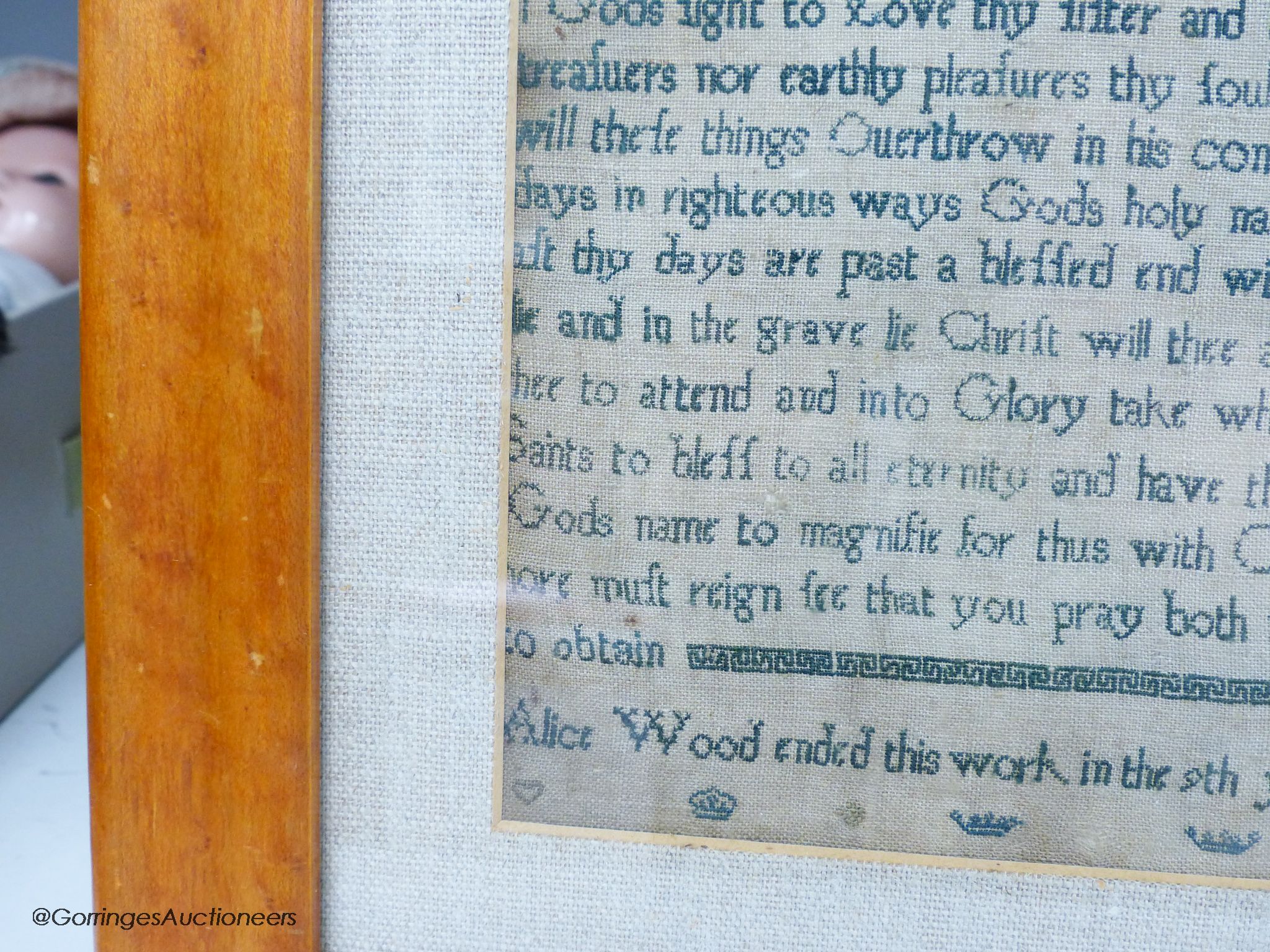 A George II needlework sampler, worked with the Lord's Prayer and religious text, by Alice Wood, dated 1736, 40 x 20cm